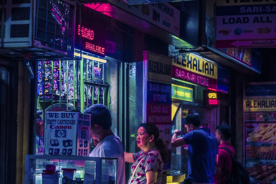Window glow and fascia after dark. Caloocan.